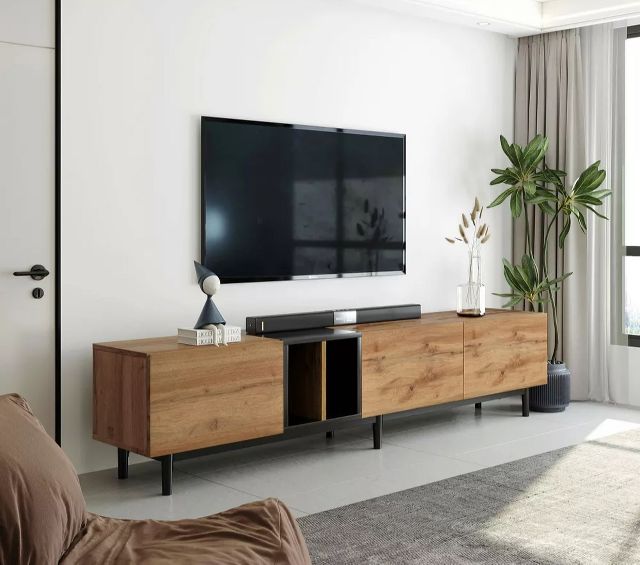 Flat screen TV in a modern living room entertainment setup.