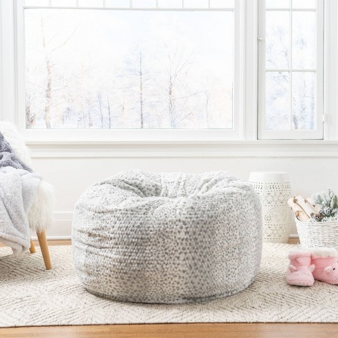 Small White Styrofoam Balls To Fill An Upholstered Chair Stock