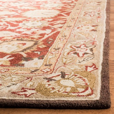 Hand-Tufted Rust and Green Wool Area Rug, 5' x 8'