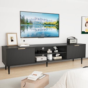 67" Black Mid-Century Modern TV Stand, Fluted Panel Entertainment Center with Cabinets, Fits TVs Up to 75" - 1 of 4