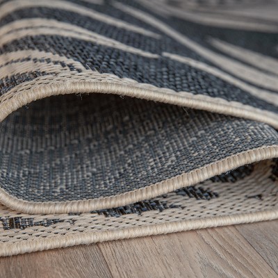 Blue and Beige Floral Synthetic 5' x 7' Area Rug