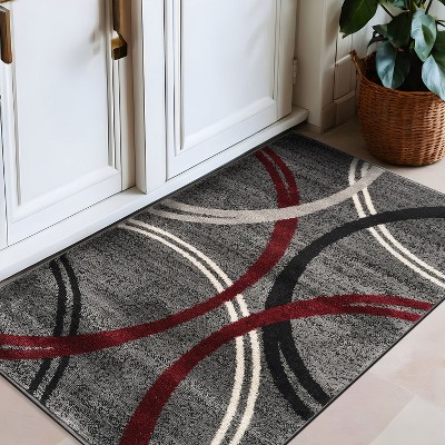 5' x 7' Red and Gray Abstract Synthetic Area Rug