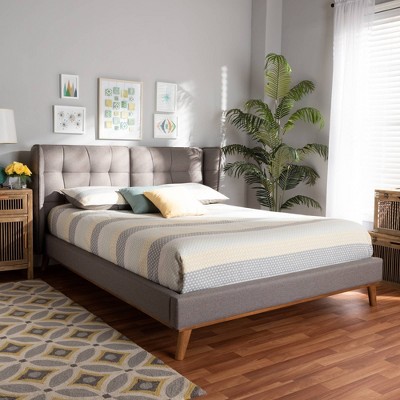 Elegant Queen-Sized Gray Upholstered Wingback Bed with Walnut Wood Frame