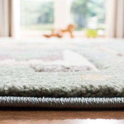 Ivory and Blue Storybook Animals Handmade Kids' Rug - 6'7" x 9'
