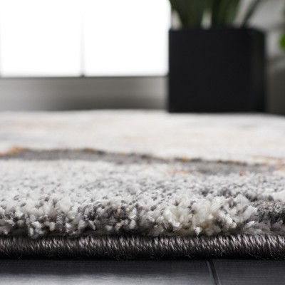 Cyrus Gray and Orange Abstract Shag Area Rug