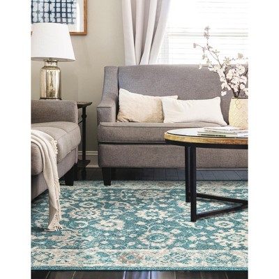 Turquoise and Beige Floral Synthetic 10' x 14' Area Rug