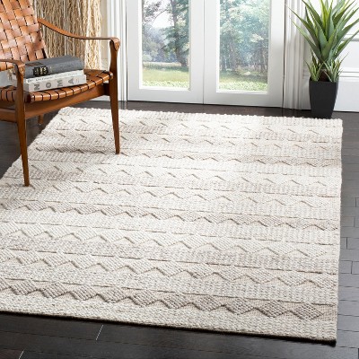 Ivory Coast Artisan Hand-Tufted Wool Rug - 5' x 8'