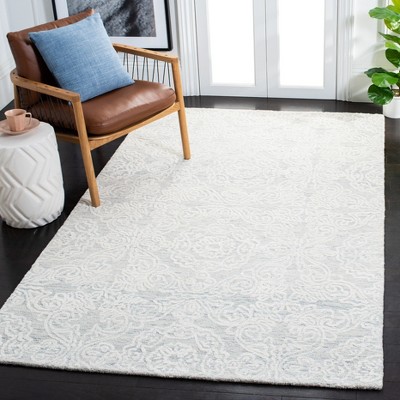 Ivory Hand-Tufted Wool 6' x 9' Rectangular Rug