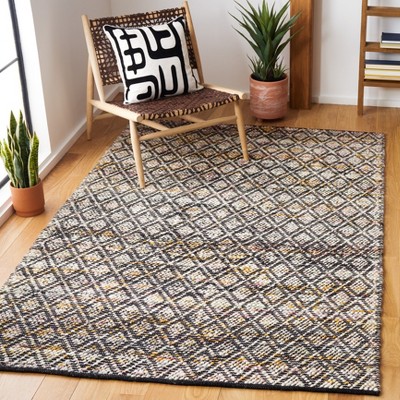 Ivory and Black Handwoven Wool Area Rug, 5' x 8'