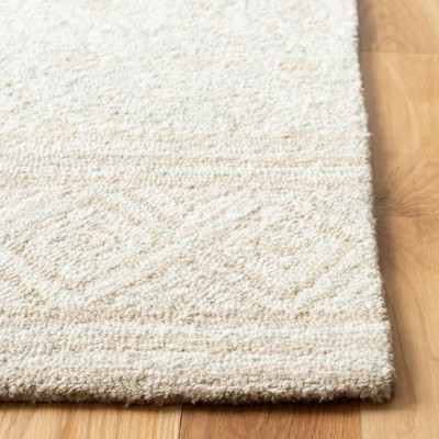 Elegant Ivory Wool 4' x 6' Hand-Tufted Rectangular Area Rug