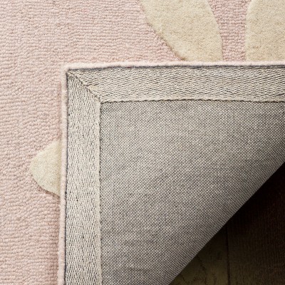 Lively Blossom Hand-Tufted Pink/Ivory Wool Round Kids Rug