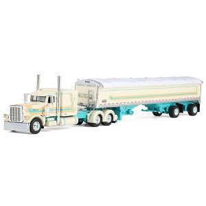 First Gear DCP 1/64 Peterbilt 389 Pride-N-Class Flat Top Sleeper with Wilson Pacesetter Spread Axle Grain Trailer 60-2154 - 1 of 4