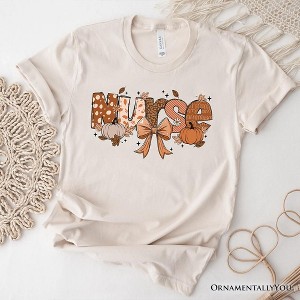 Nurse Coquette Autumn T-Shirt, Cozy Fall Pumpkins Tee for Healthcare Heroes| OrnamentallyYou - 1 of 4