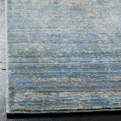 Mystique Blue and Multicolor Abstract Synthetic Area Rug