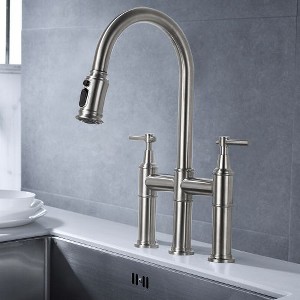 Polished Bridge Faucet with Pull-Down Spray for Kitchen Elegance - 1 of 4