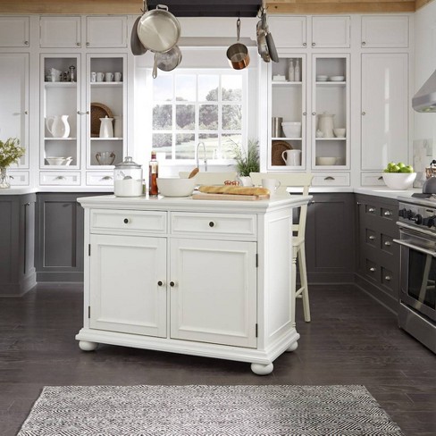 white kitchen island with seating