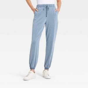 Pantalones jogger de mezclilla para mujer con cintura y puños elásticos - A New Day™ azul claro