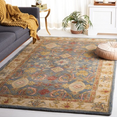 Handmade Light Blue and Ivory Floral Wool 6' x 9' Area Rug