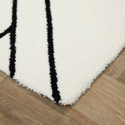 Luxurious White Synthetic 5' x 7' Easy-Care Geometric Rug