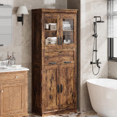 Rustic tall cabinet in bathroom setting with towel shelves and sink nearby