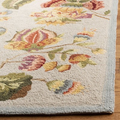 Handmade Light Blue Floral Wool Rectangular Area Rug