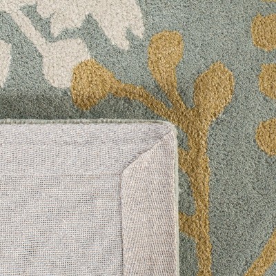Light Blue and Multi Floral Hand-Tufted Wool Area Rug
