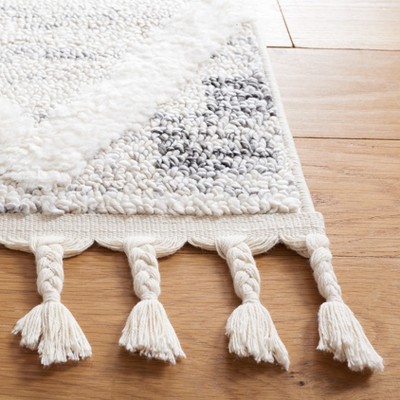 Ivory and Beige Diamond Shag Synthetic Area Rug with Braided Fringe