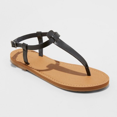 black and tan flip flops