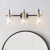 Dewdrop Minimalist 3-Light Vanity Wall Fixture, Black and Gold Industrial Sconce with Clear Glass Lampshades - 2 of 4