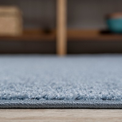 Classic Blue Oval 4' x 6' Synthetic Area Rug