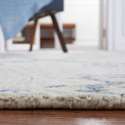 Blue and Ivory Hand-Tufted Wool 8' x 10' Area Rug