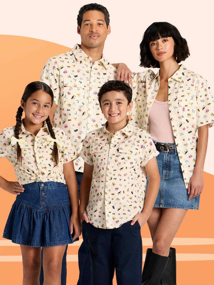 Family dressed in matching button down shirts
