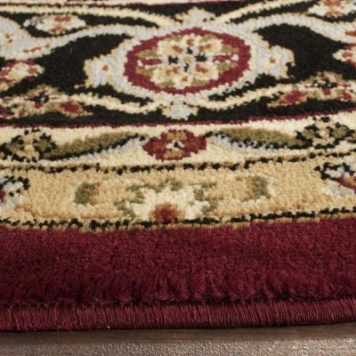 Lyndhurst Red and Black Round Floral Synthetic Rug