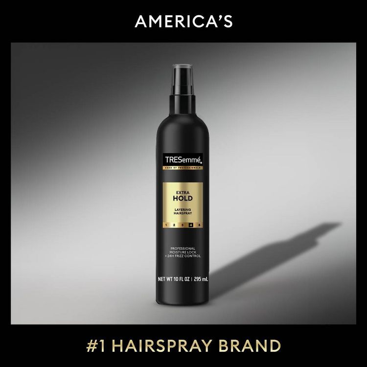 Black colored bottle of TRESemmé Extra Hold Layering Hairspray with a label showing 10 fl oz / 295 mL.