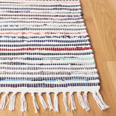Ivory and Multi 5' x 7' Handwoven Cotton Area Rug