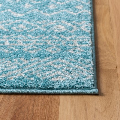 Turquoise and Ivory Hand-knotted Synthetic 8' x 10' Area Rug