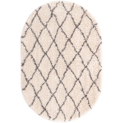 4' x 6' Oval Ivory Geometric Shag Synthetic Area Rug