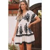 Amaryllis Women’s V-Neck Short Sleeve Mini Dress Black Contrast Trim Tiered Hem Bold Pattern Loose Fit - 2 of 4