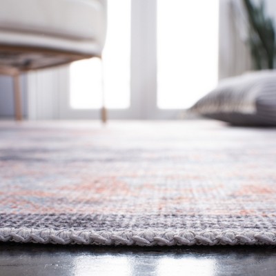 Serapi 6'7" x 9' Blue and Terracotta Washable Area Rug