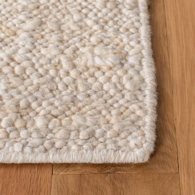 Ivory Handwoven Wool Rectangular 8' x 10' Area Rug