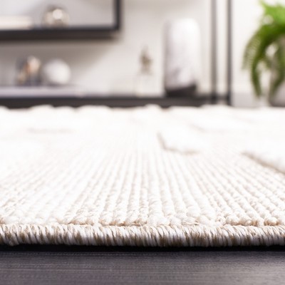 Ivory Geometric 9' x 12' Synthetic Easy Care Area Rug
