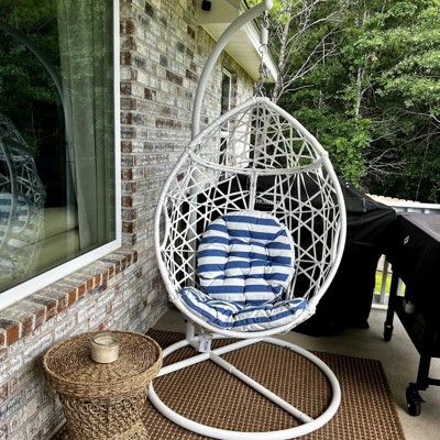 Belham living resin wicker blanca hanging egg 2025 chair with cushion color option and stand