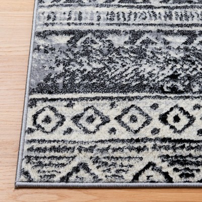 Brentwood Black and Ivory 8' x 10' Synthetic Area Rug