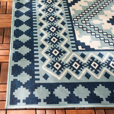 Blue and Ivory Synthetic Easy Care Indoor/Outdoor Rug