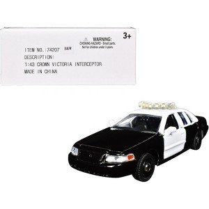 Ford Crown Victoria Police Interceptor Black and White 1/43 Diecast Model Car by Motormax - 1 of 4