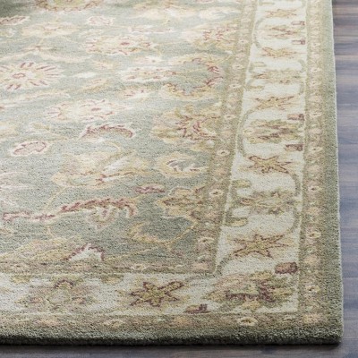 Handmade Green and Gold Wool Persian Runner Rug