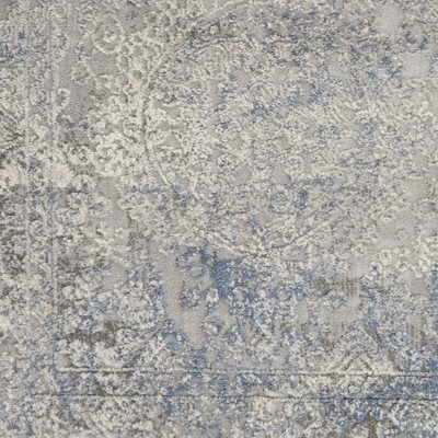 Ivory Elegance 5'3" x 7'3" Synthetic Vintage Persian Rug