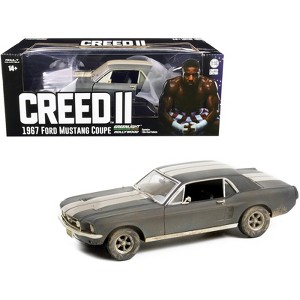 1967 Ford Mustang Coupe Matt Black with White Stripes (Weathered) "Creed II" (2018) Movie 1/18 Diecast Model Car by Greenlight - 1 of 3