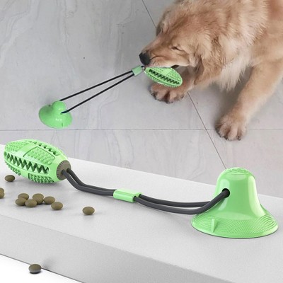 Green Rubber Football Shaped Treat Dispensing Suction Cup Dog Toy