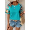 Amaryllis Women's Crochet Sleeve Top Relaxed Fit Boho Chic Short Sleeve Knit Detail Stylish Casual - 2 of 4
